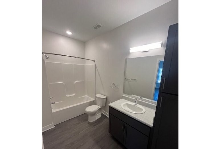 2701 Drewry's Bluff Road Richmond, VA 23237 - Photo 9 of 9 a bathroom with a sink a toilet and shower