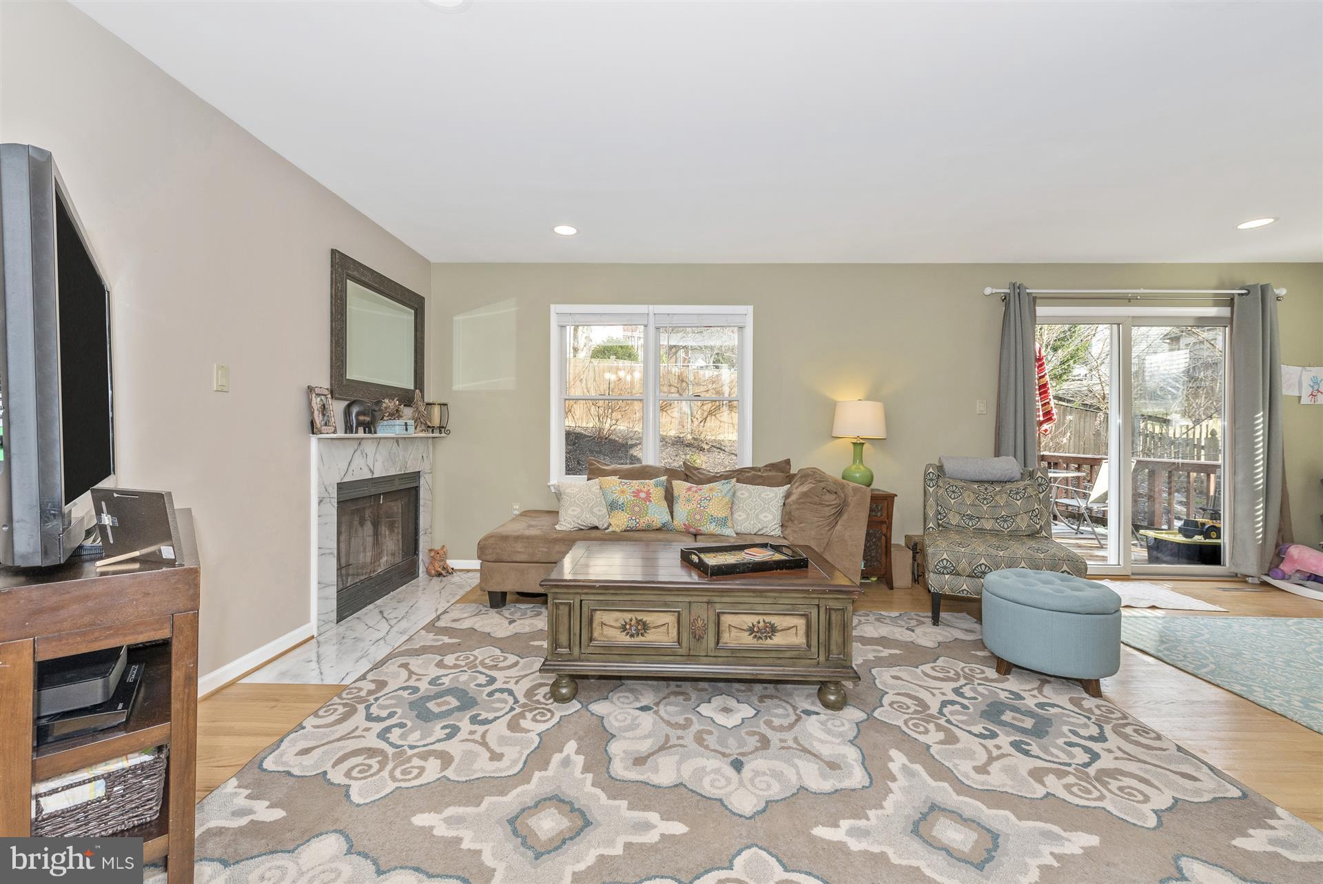 6589 Hemlock Point Road New Market, MD 21774 - Photo 10 of 30 Living Room with wood burning fireplace