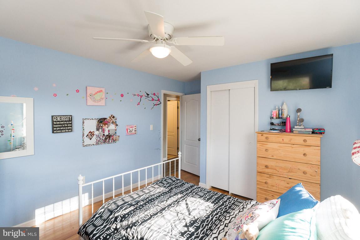 3201 Hunt Road Fallston, MD 21047 - Photo 16 of 29 a bedroom with a bed and flat screen tv