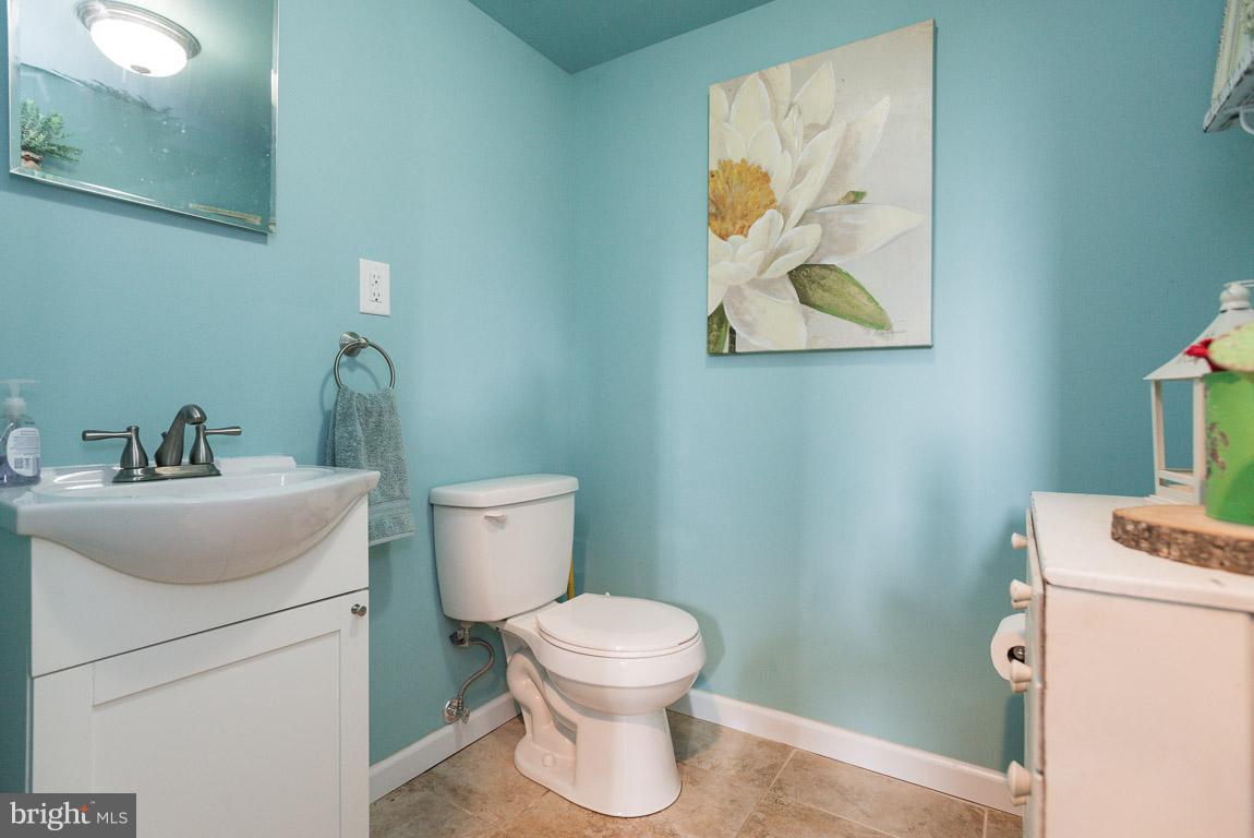 3201 Hunt Road Fallston, MD 21047 - Photo 24 of 29 a bathroom with a toilet a sink and mirror