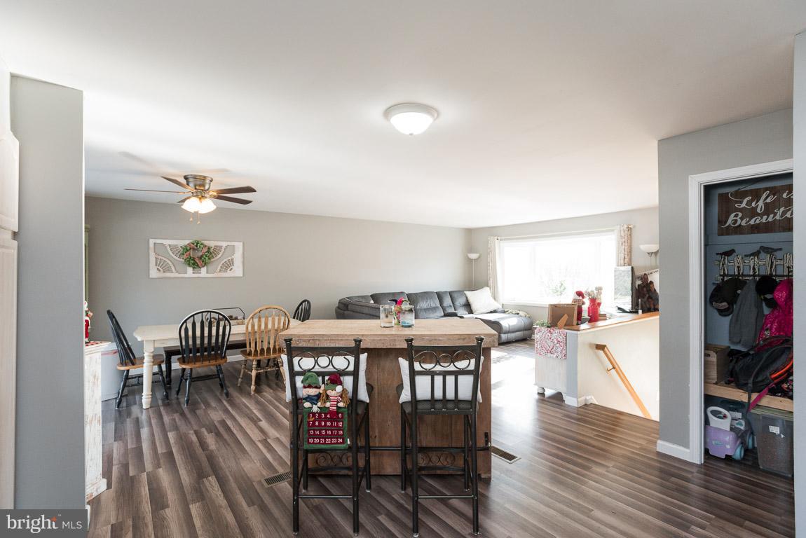 3201 Hunt Road Fallston, MD 21047 - Photo 29 of 29 a view of a dining room with furniture wooden floor and chandelier