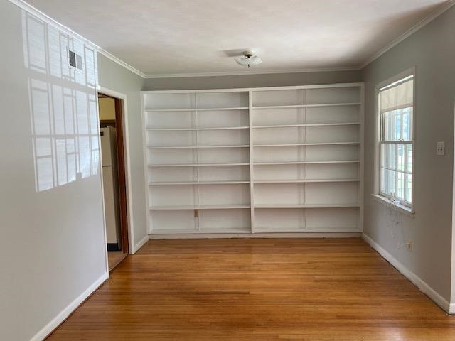 1552 Delmont Road Memphis, TN 38117 - Photo 6 of 22 Bookshelves in the dining area.