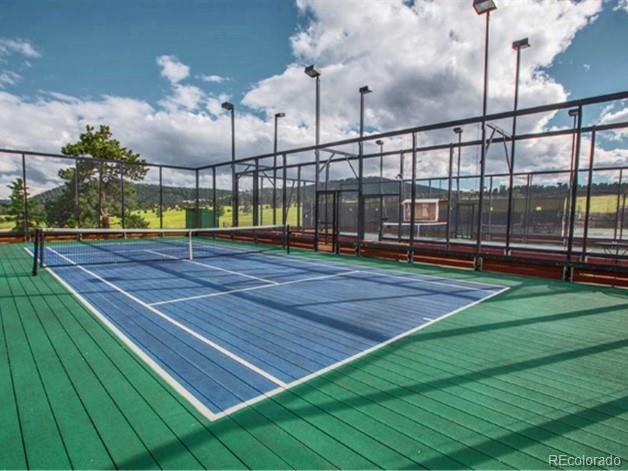 25997 Mountain View Road Golden, CO 80401 - Photo 22 of 23 a view of a tennis court