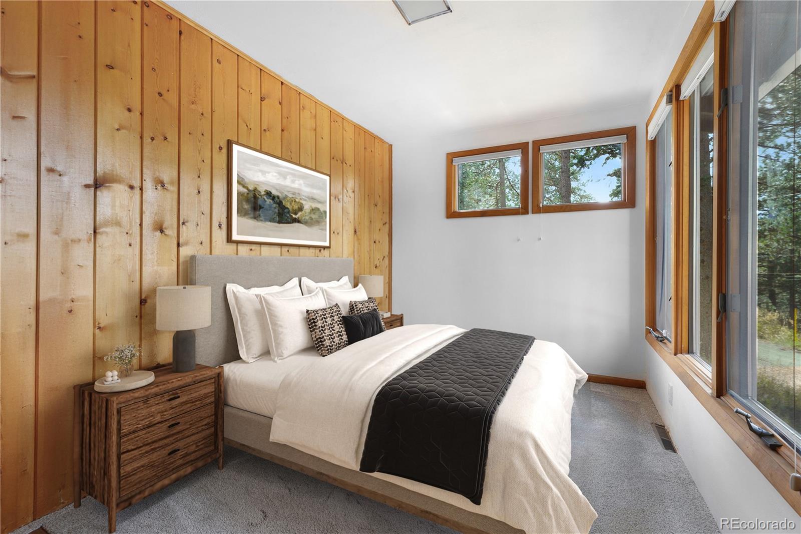 25997 Mountain View Road Golden, CO 80401 - Photo 10 of 23 a bedroom with a bed and a window