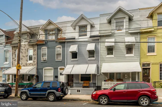 a car parked in front of a building