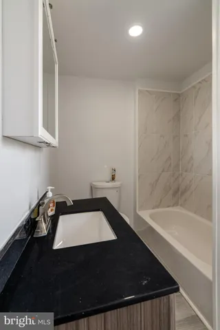 a bathroom with a bathtub