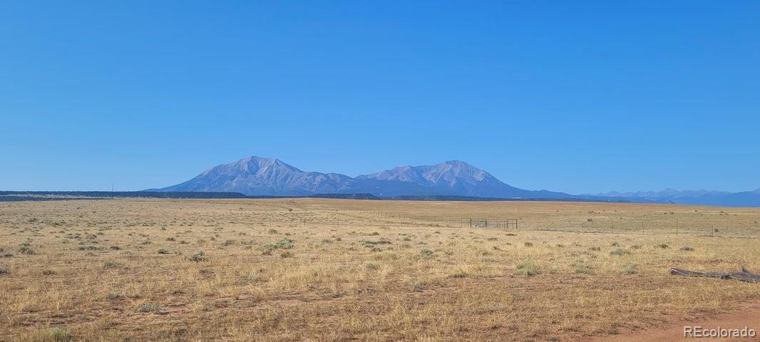 a view of an ocean beach and mountain view
