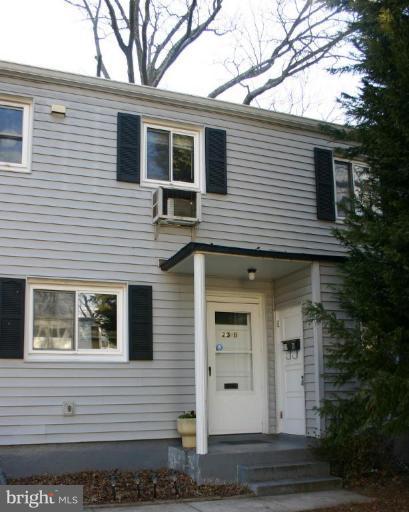 23 Ridge Road, Unit B Greenbelt, MD 20770 - Photo 25 of 30 Front Elevation (note: thru-wall A/C unit)