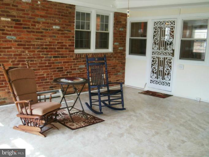 2007 Shenandoah Road Alexandria, VA 22308 - Photo 27 of 30 Enclosed porch with new flooring