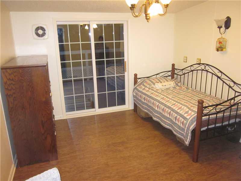 355 Rankin Road Belle Vernon, PA 15012 - Photo 9 of 25 Bedroom. Beautiful wood floors and access to the deck adds lots of appeal to this room!