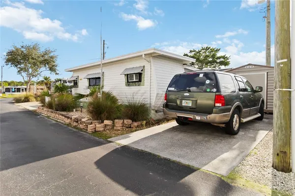 a view of a back yard of the house