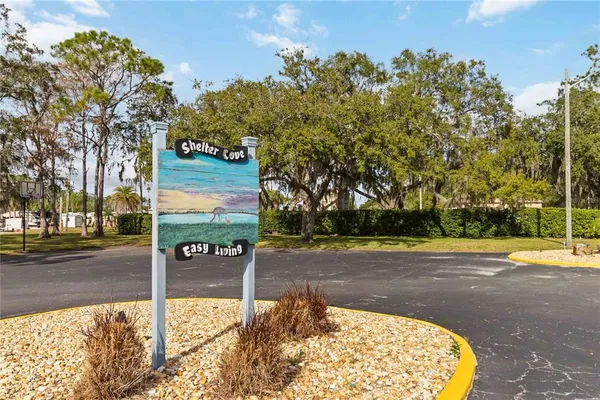 a view of a street with a yard