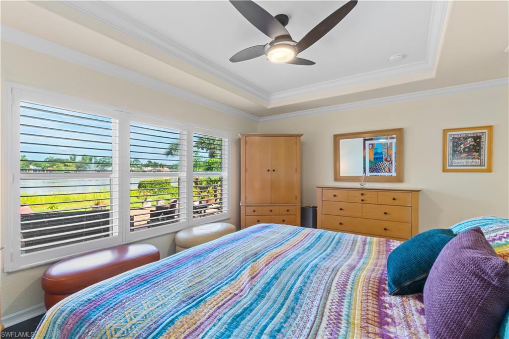 19703 Villa Rosa Loop Estero, FL 33967 - Photo 11 of 29 a bedroom with a bed and a large window