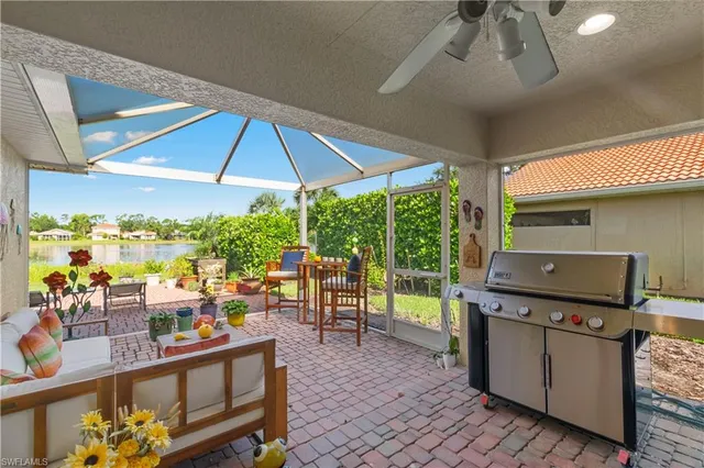 a view of a chairs and table in patio