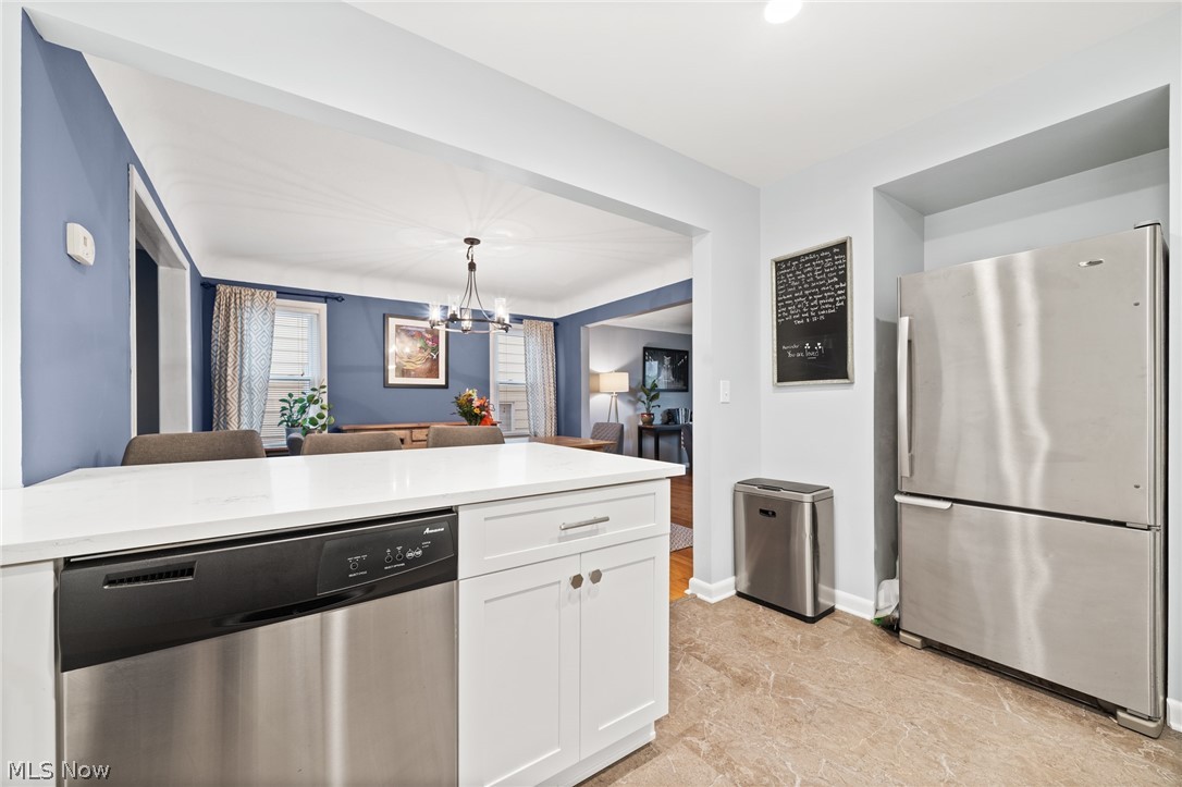 4536 Mackall Road South Euclid, OH 44121 - Photo 6 of 23 Access to dining room and living room for easy entertaining!