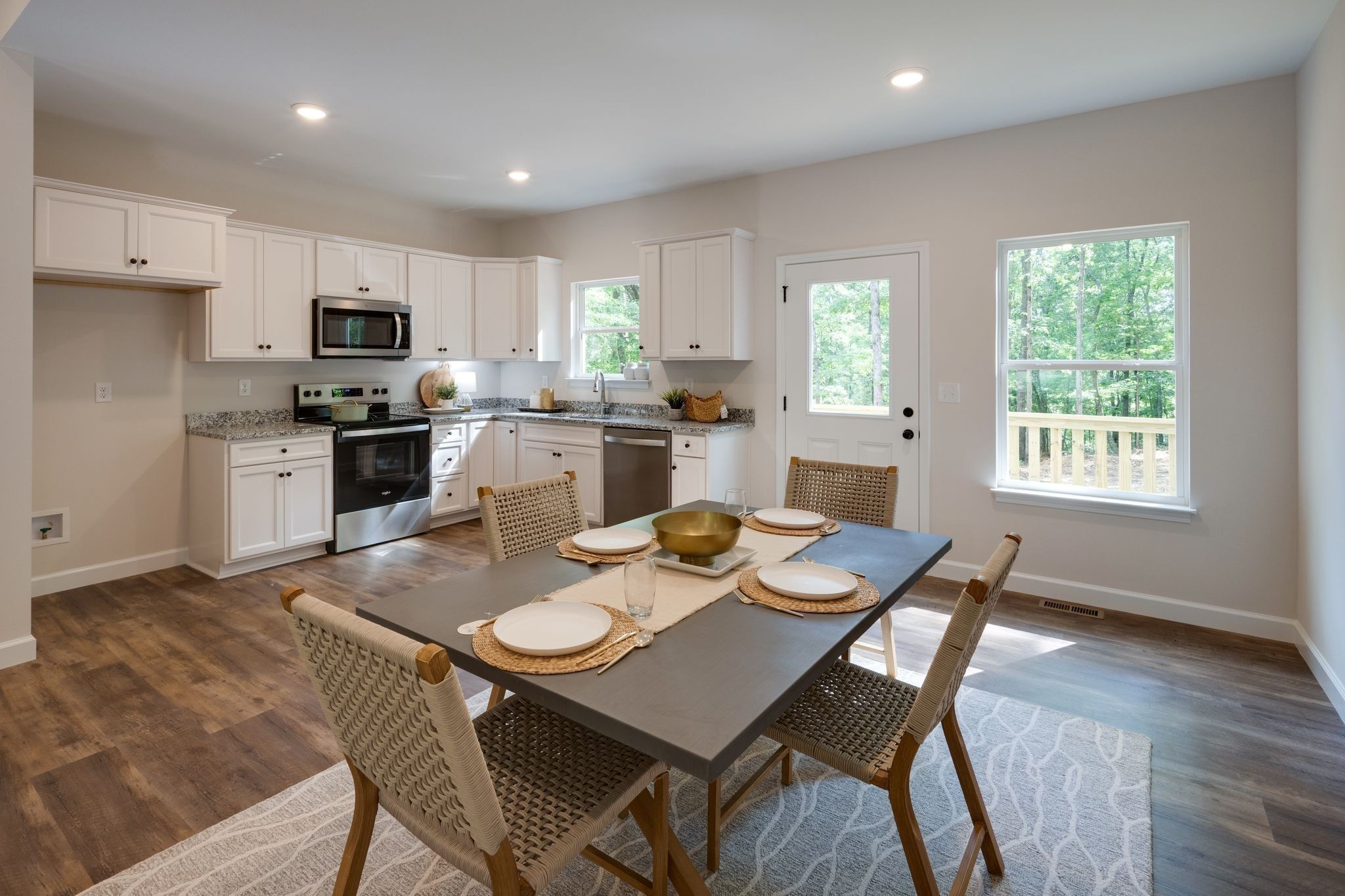 766 Billy Wynn Road Dickson, TN 37055 - Photo 11 of 31 a kitchen with a dining table and chairs