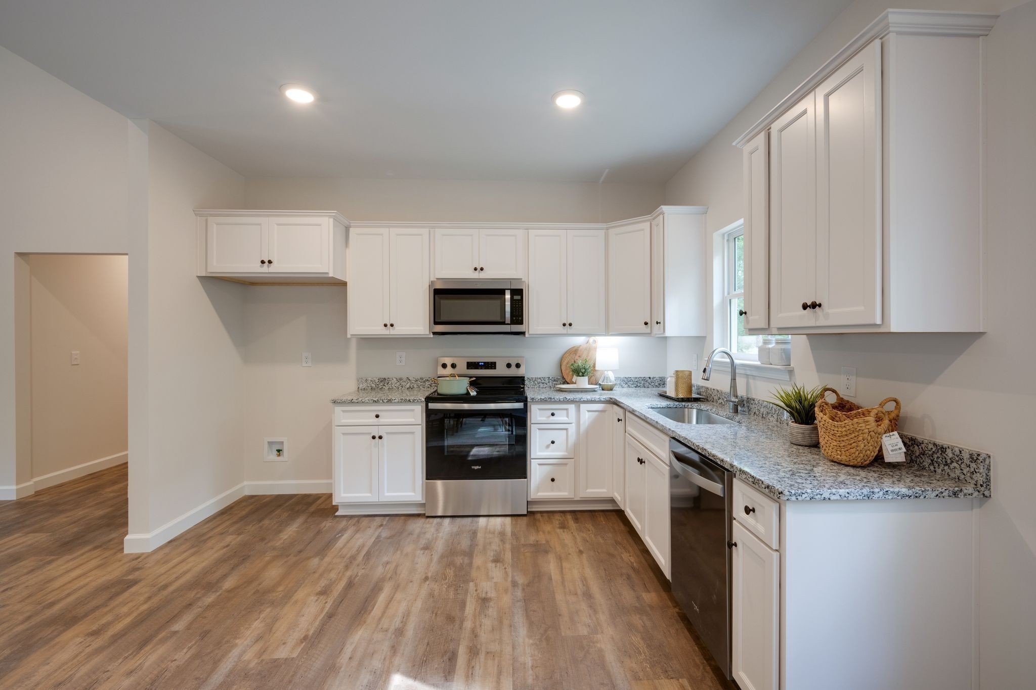 766 Billy Wynn Road Dickson, TN 37055 - Photo 12 of 31 a kitchen with granite countertop a sink cabinets stainless steel appliances and a counter space