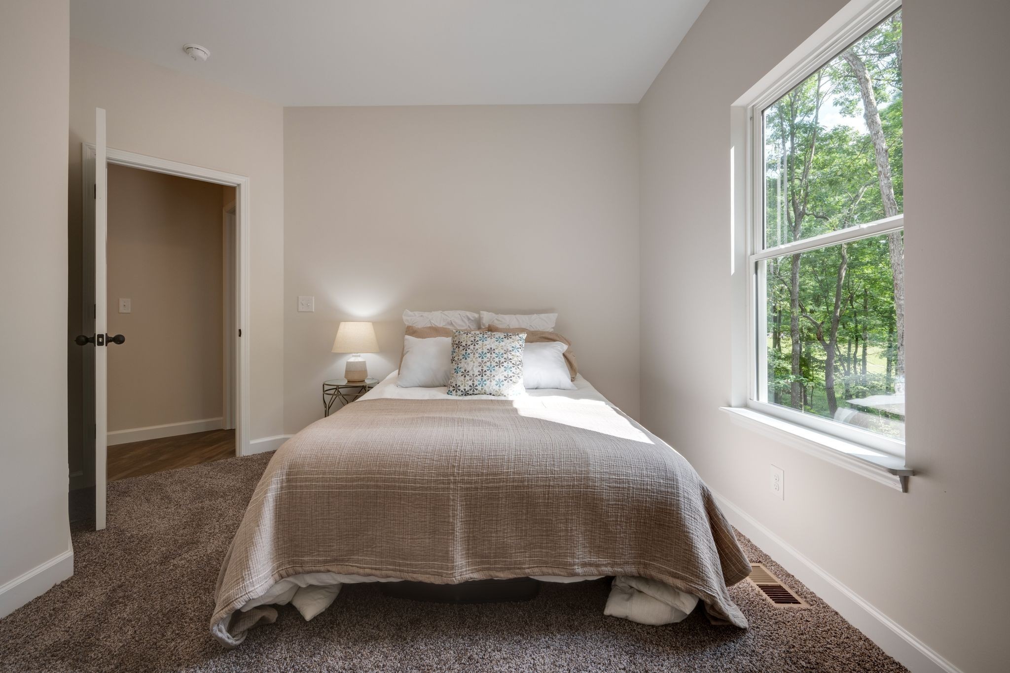 766 Billy Wynn Road Dickson, TN 37055 - Photo 25 of 31 a bedroom with a bed and a window