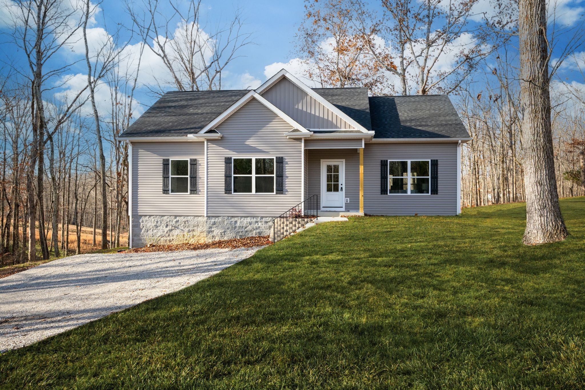 766 Billy Wynn Road Dickson, TN 37055 - Photo 26 of 31 a front view of a house with a yard