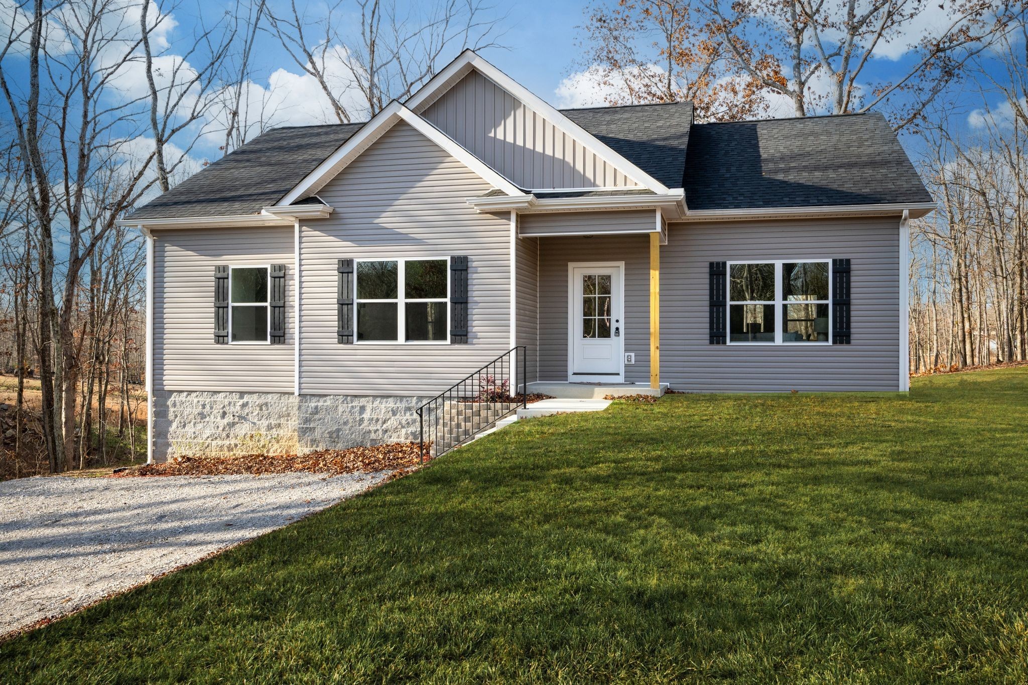 766 Billy Wynn Road Dickson, TN 37055 - Photo 6 of 31 a front view of a house with a yard