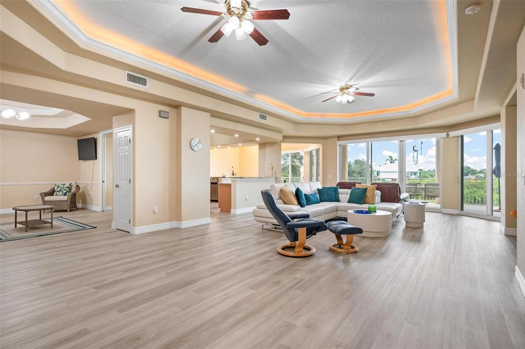 6100 Jessie Harbor Drive, Unit 202 Osprey, FL 34229 - Photo 30 of 83 a living room with furniture and wooden floor