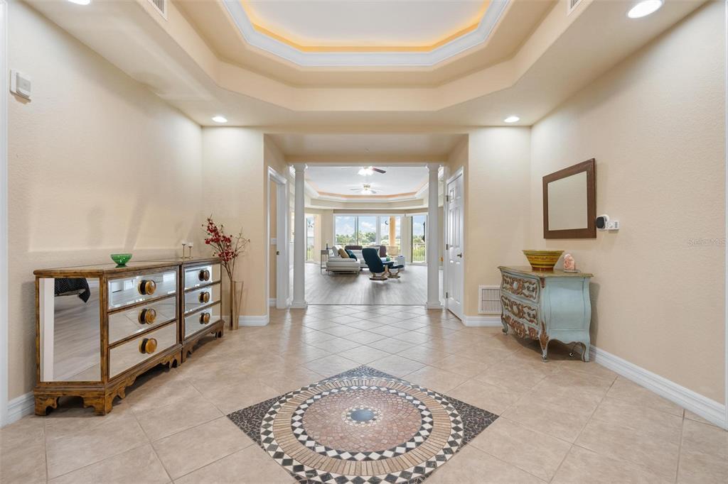 6100 Jessie Harbor Drive, Unit 202 Osprey, FL 34229 - Photo 3 of 83 a living room with furniture and a table