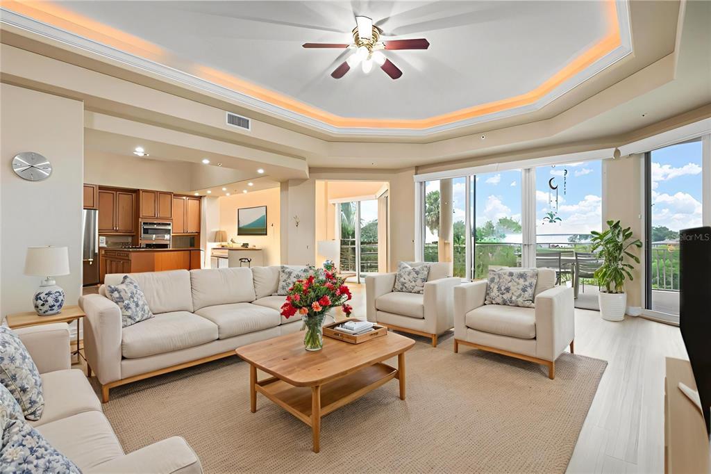 6100 Jessie Harbor Drive, Unit 202 Osprey, FL 34229 - Photo 31 of 83 a living room with furniture and a large window