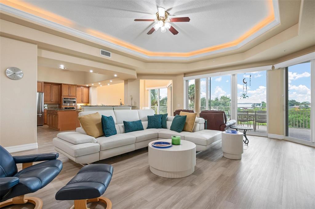 6100 Jessie Harbor Drive, Unit 202 Osprey, FL 34229 - Photo 33 of 83 a living room with furniture and a large window