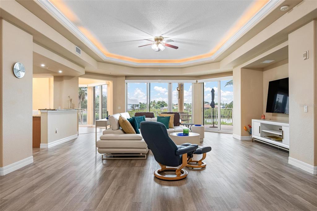 6100 Jessie Harbor Drive, Unit 202 Osprey, FL 34229 - Photo 34 of 83 a living room with furniture and a large window