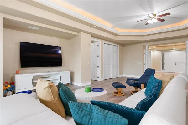 a living room with furniture and a large window