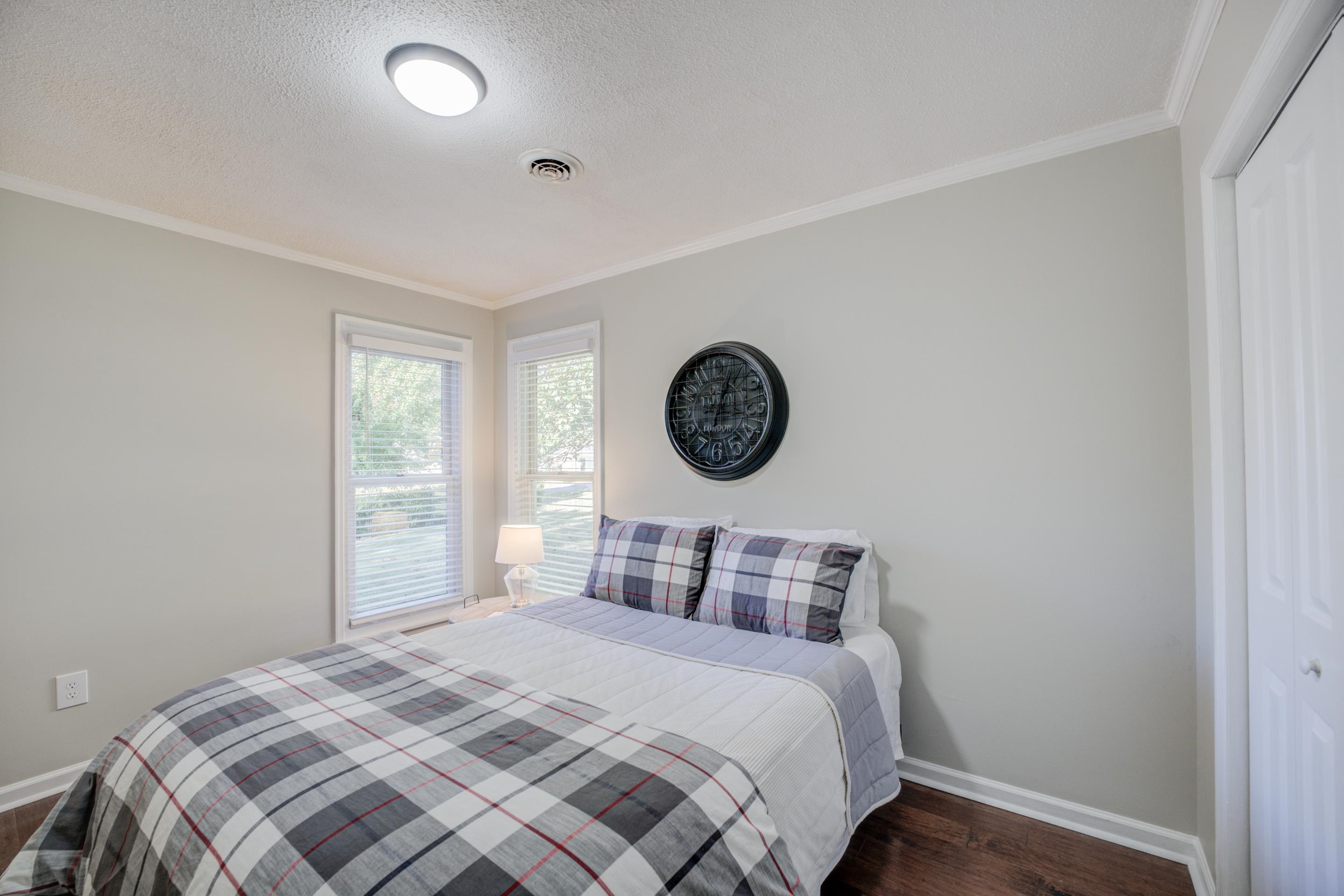 83 Barry White Lane Ripley, TN 38063 - Photo 24 of 37 a bedroom with a bed and a window