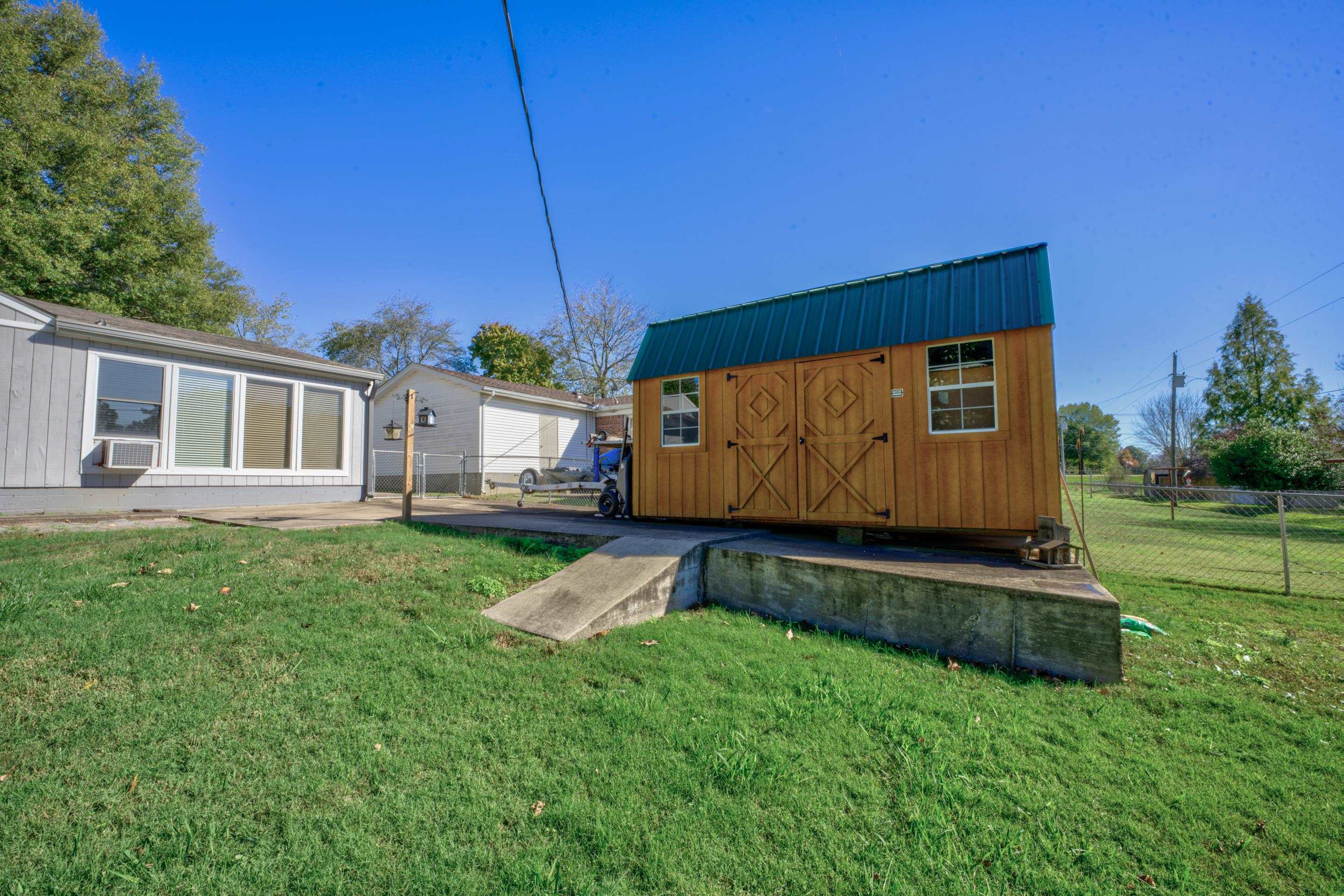 83 Barry White Lane Ripley, TN 38063 - Photo 36 of 37 a view of backyard with house