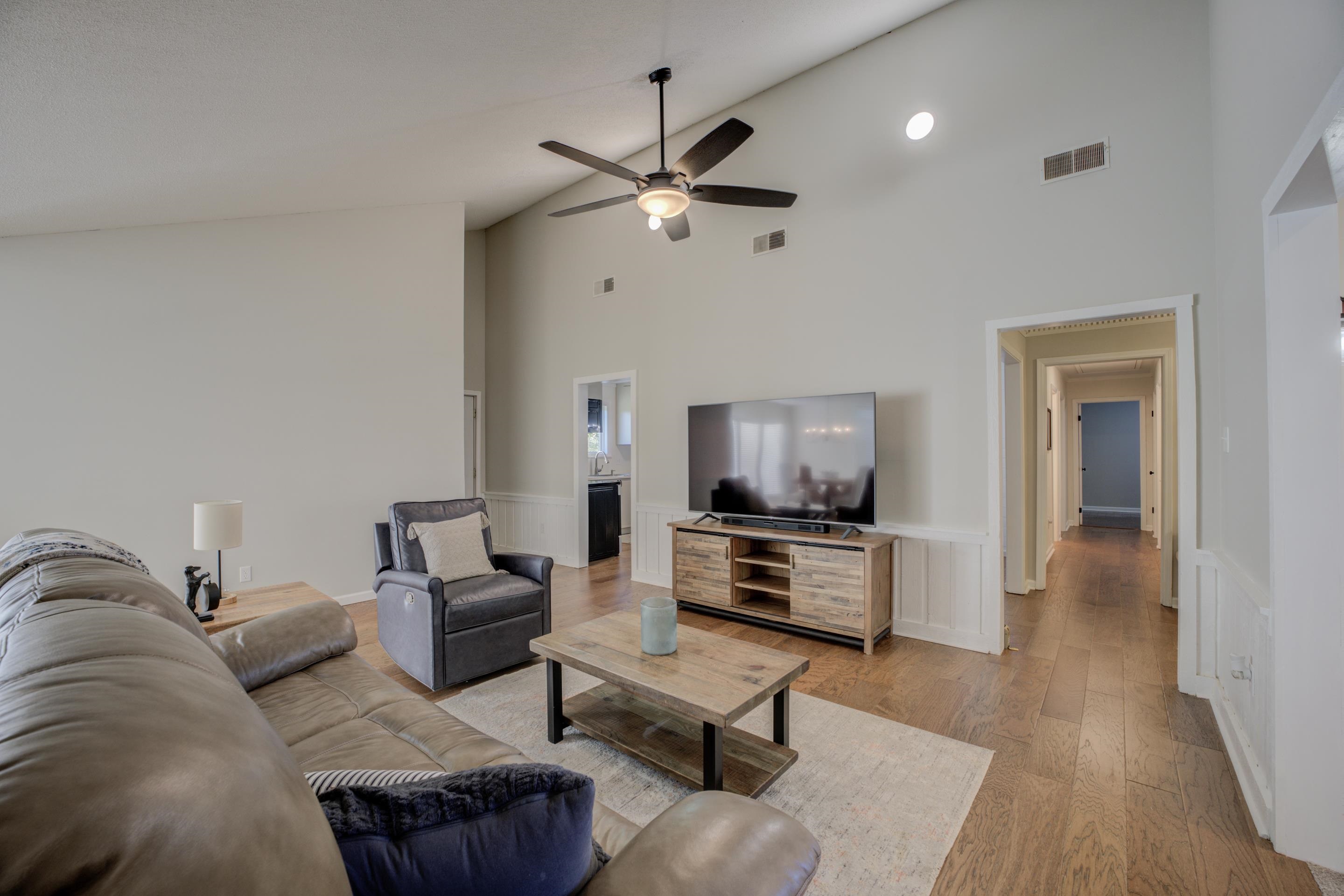 83 Barry White Lane Ripley, TN 38063 - Photo 9 of 37 a living room with furniture and a wooden floor