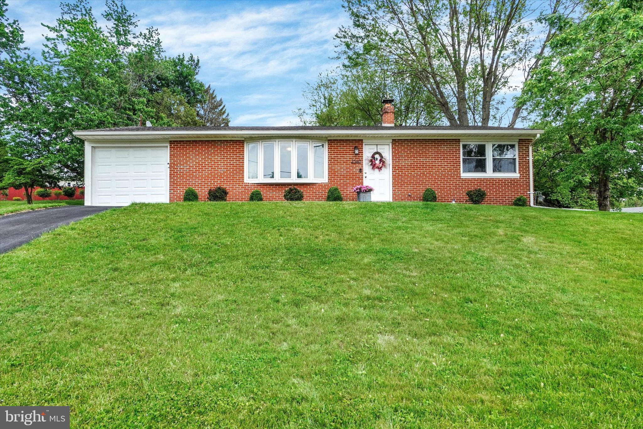 2560 Log Cabin Road York, PA 17408 - Photo 1 of 26 front view of a house with a yard