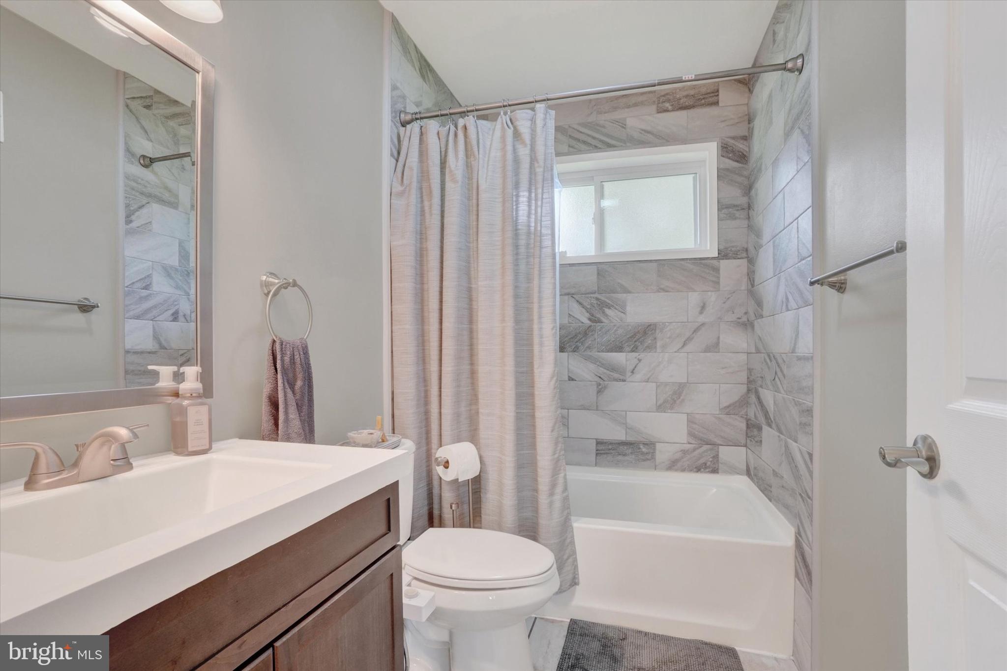 2560 Log Cabin Road York, PA 17408 - Photo 14 of 26 a bathroom with a sink toilet and shower