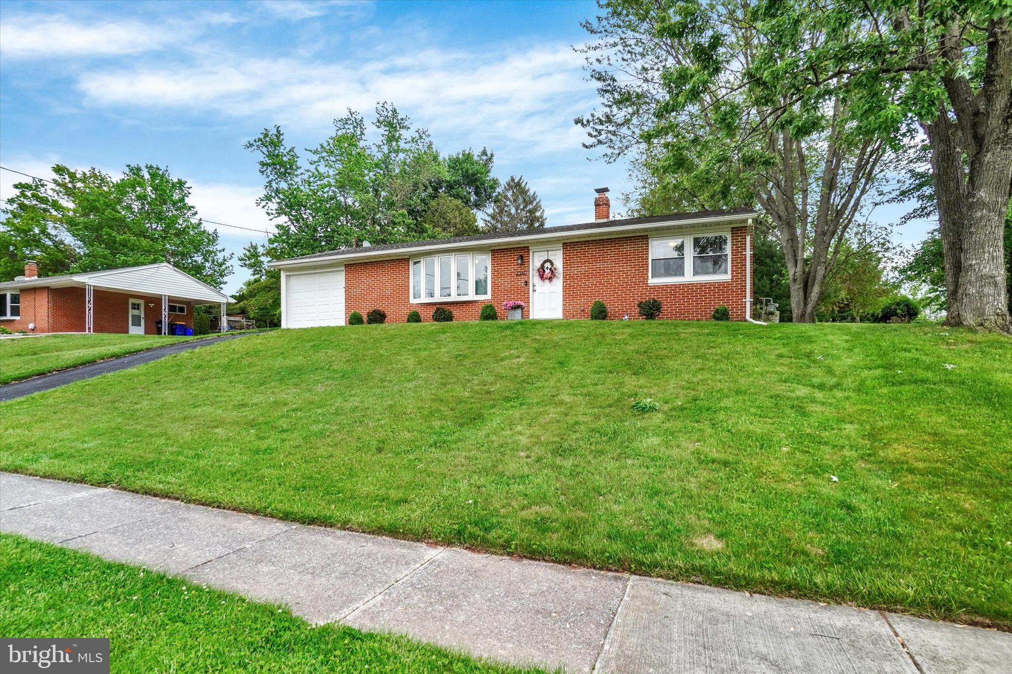 2560 Log Cabin Road York, PA 17408 - Photo 2 of 26 a house view with a garden space