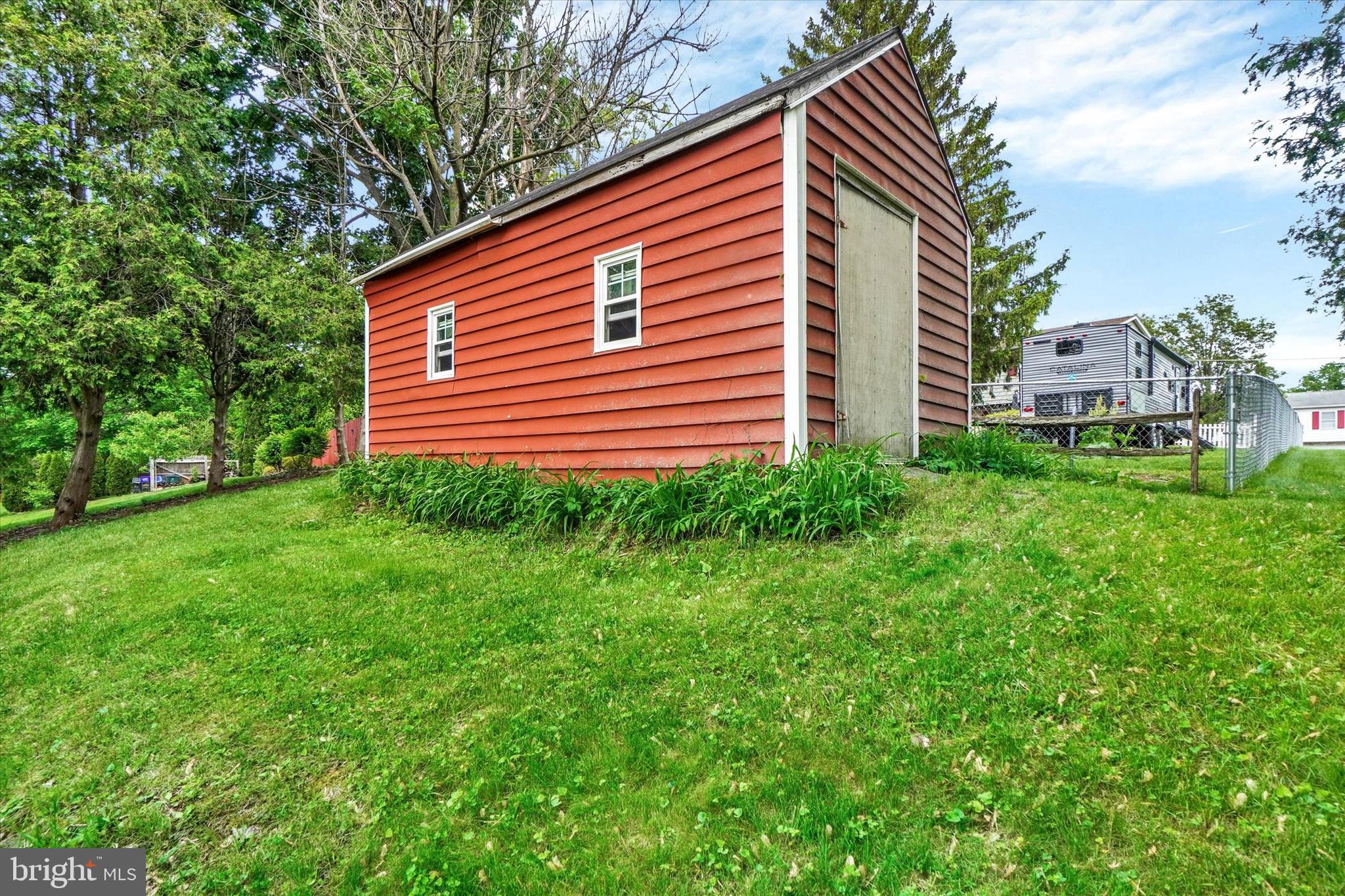 2560 Log Cabin Road York, PA 17408 - Photo 24 of 26 a backyard of a house with lots of green space