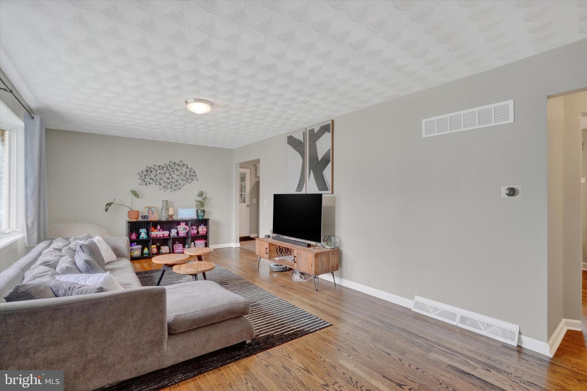 2560 Log Cabin Road York, PA 17408 - Photo 6 of 26 a living room with furniture and a flat screen tv