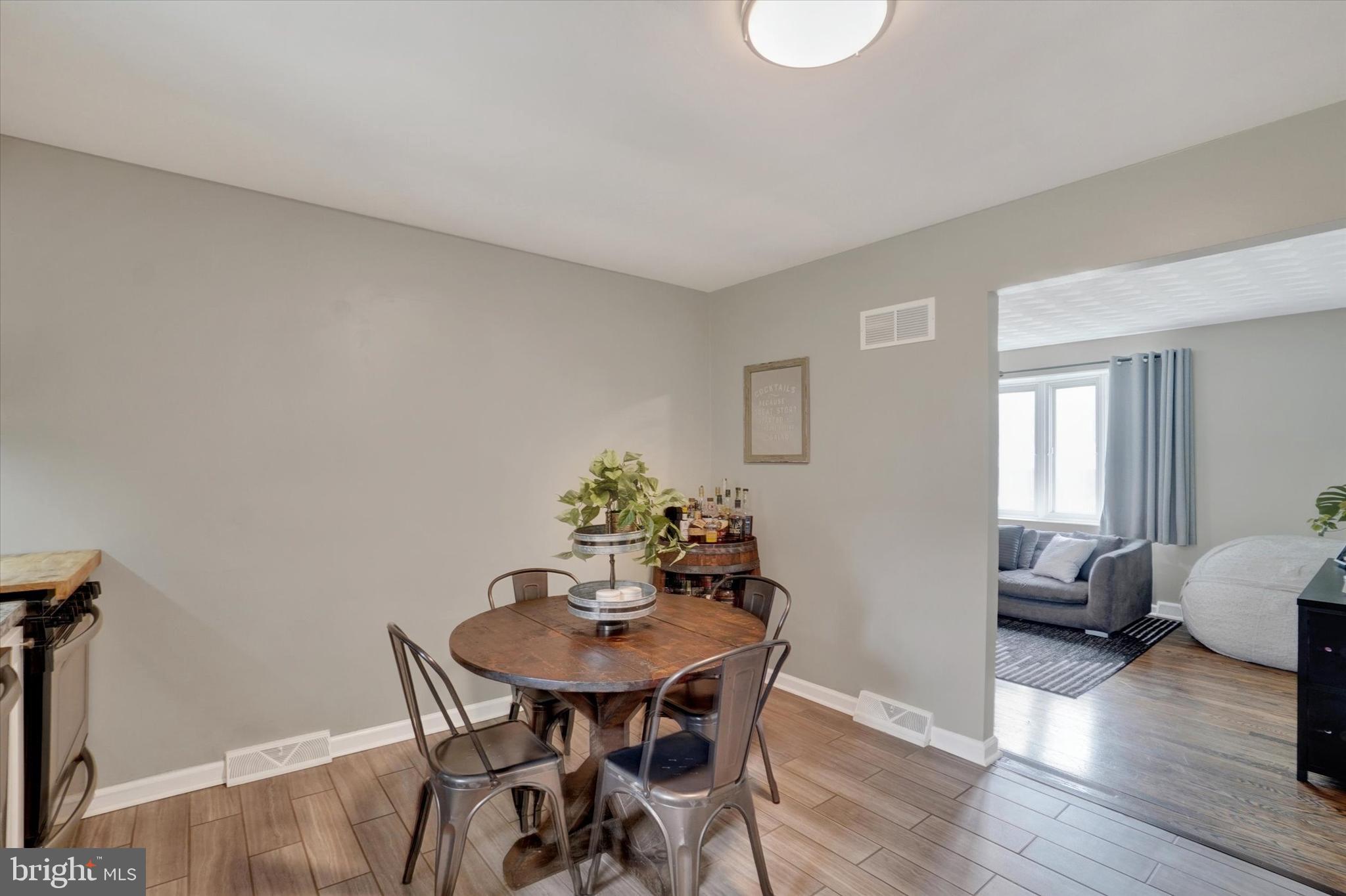 2560 Log Cabin Road York, PA 17408 - Photo 10 of 26 a view of a dining room with furniture and wooden floor