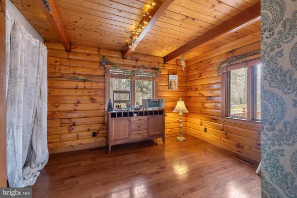 a hallway with wooden floors