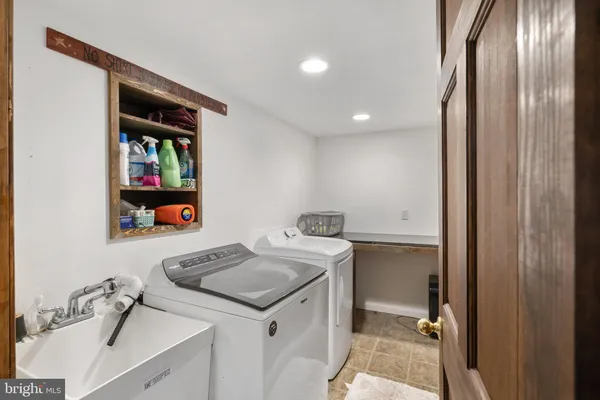 a bedroom with a bed and furniture