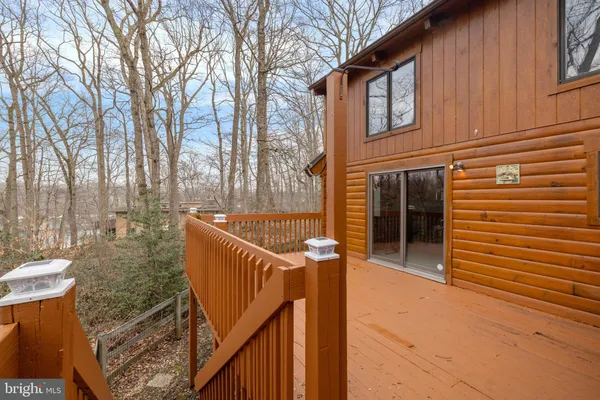 a view of a backyard with sitting area