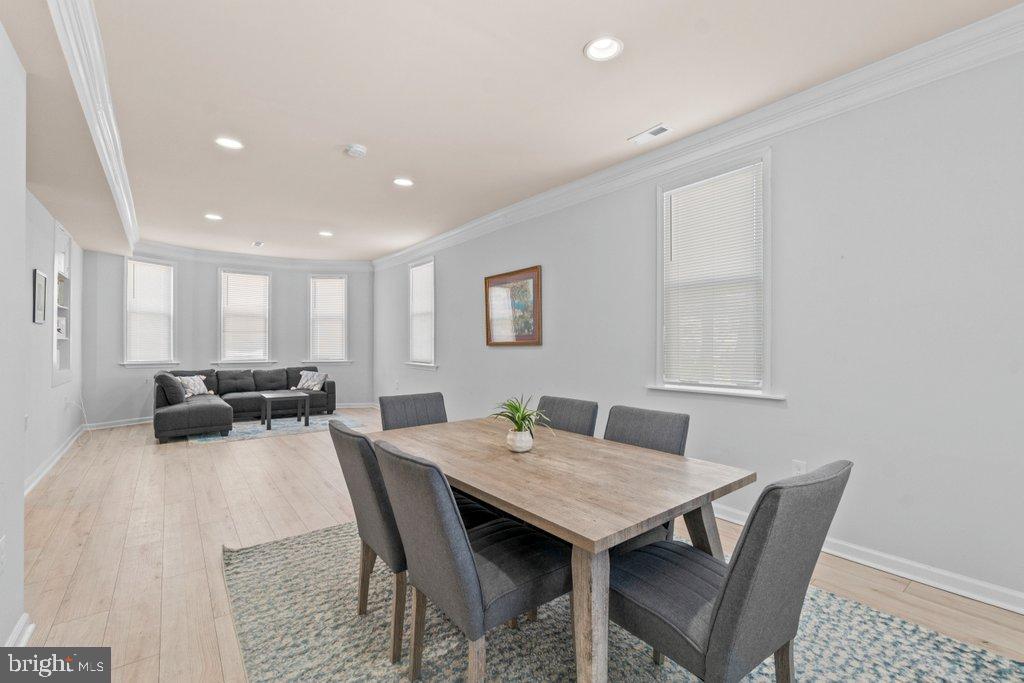4919 Harford Road Baltimore, MD 21214 - Photo 20 of 48 a view of a dining room with furniture