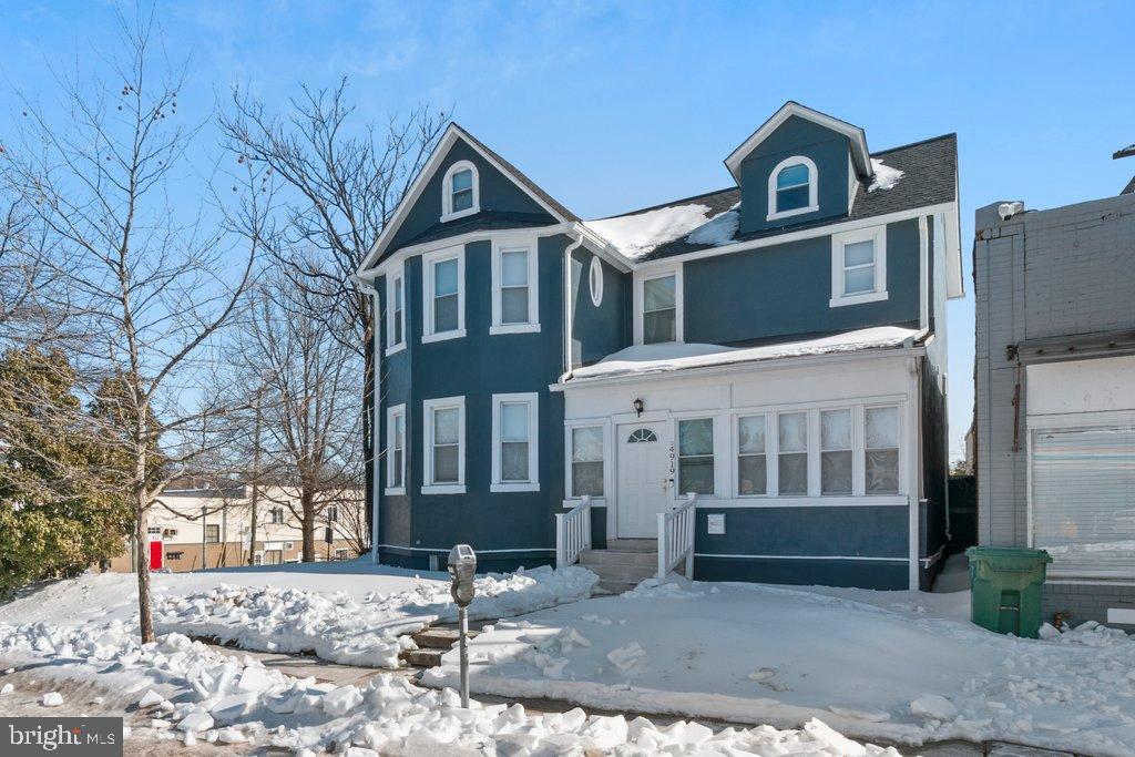 4919 Harford Road Baltimore, MD 21214 - Photo 3 of 48 a front view of a house with a yard