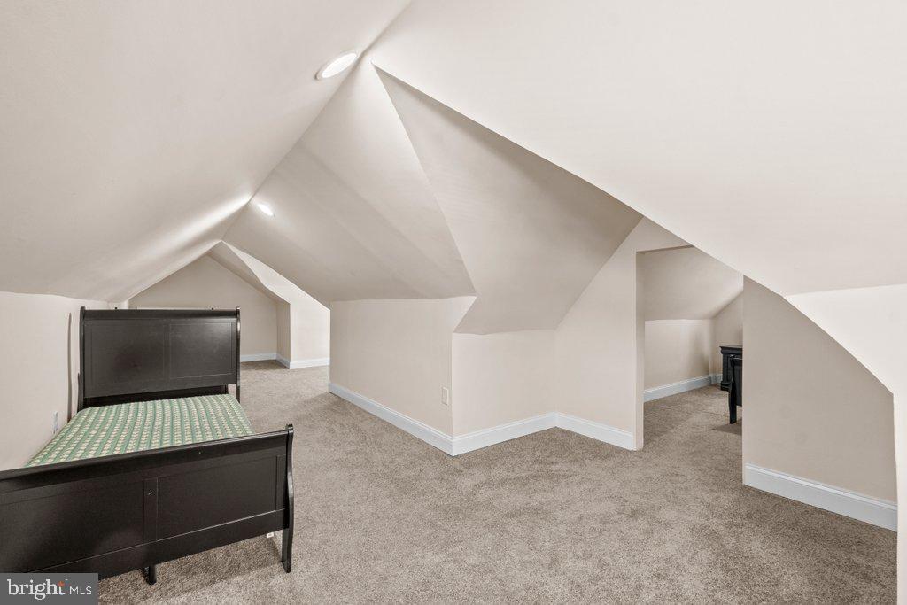 4919 Harford Road Baltimore, MD 21214 - Photo 39 of 48 a living room with a couch and a rug