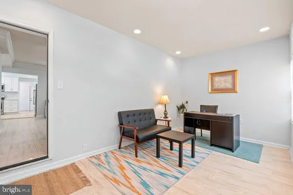 a living room with a couch and a table