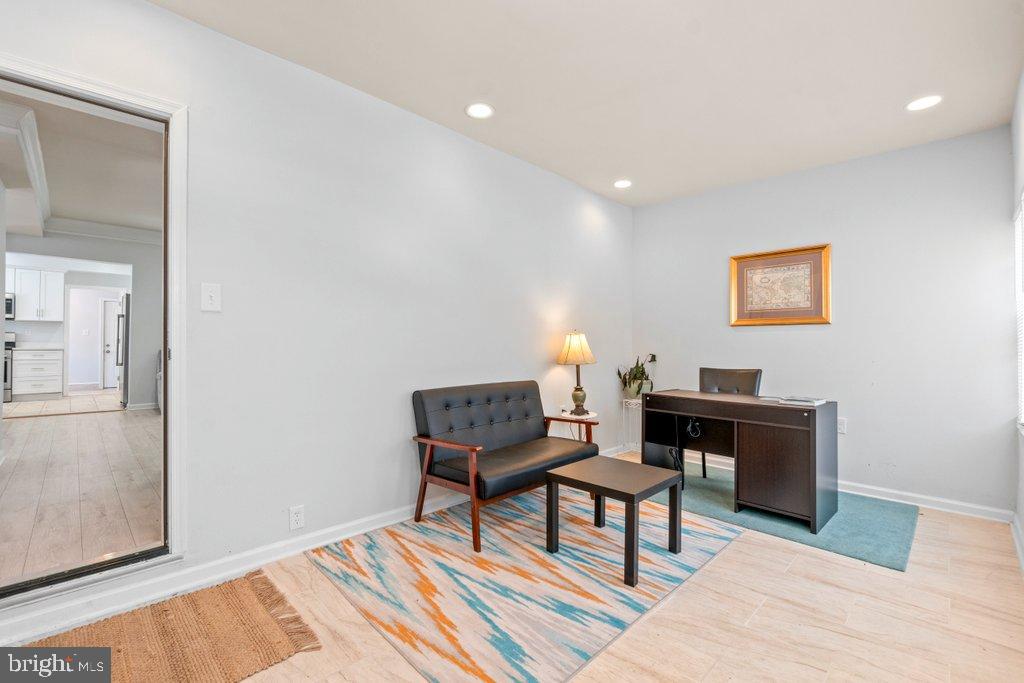 4919 Harford Road Baltimore, MD 21214 - Photo 4 of 48 a living room with a couch and a table