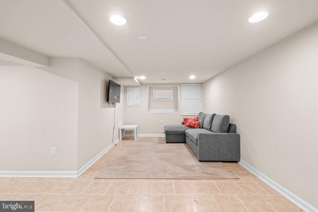 4919 Harford Road Baltimore, MD 21214 - Photo 41 of 48 a living room with furniture and a couch