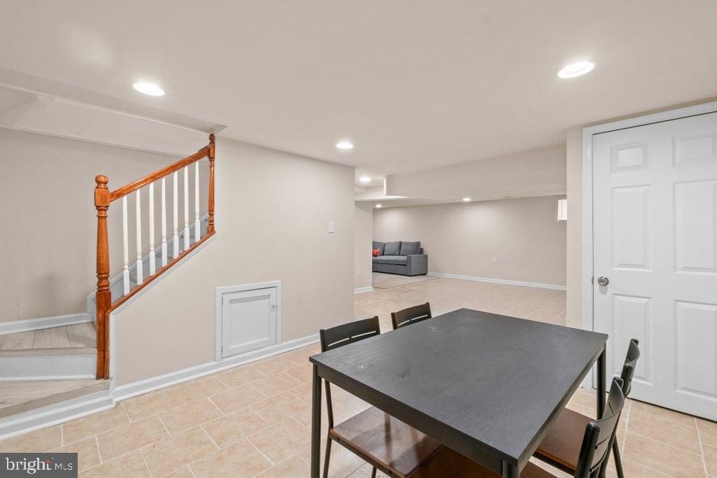 4919 Harford Road Baltimore, MD 21214 - Photo 42 of 48 a view of a kitchen with a table and chairs