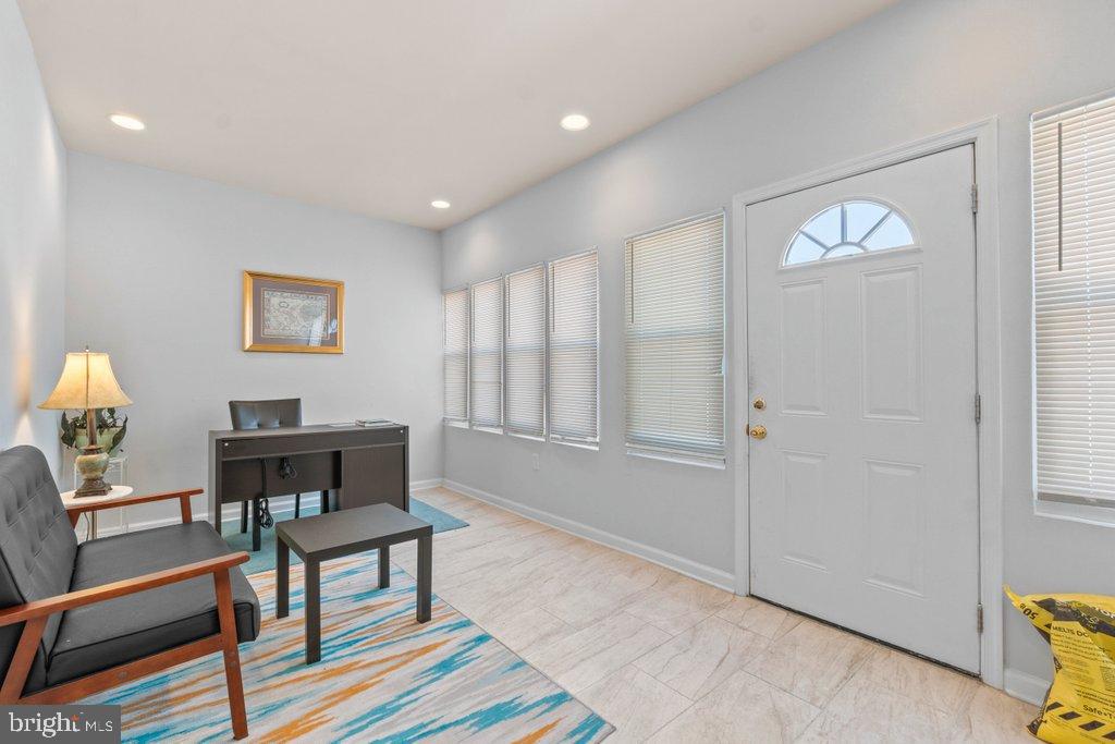 4919 Harford Road Baltimore, MD 21214 - Photo 5 of 48 a living room with furniture and a window
